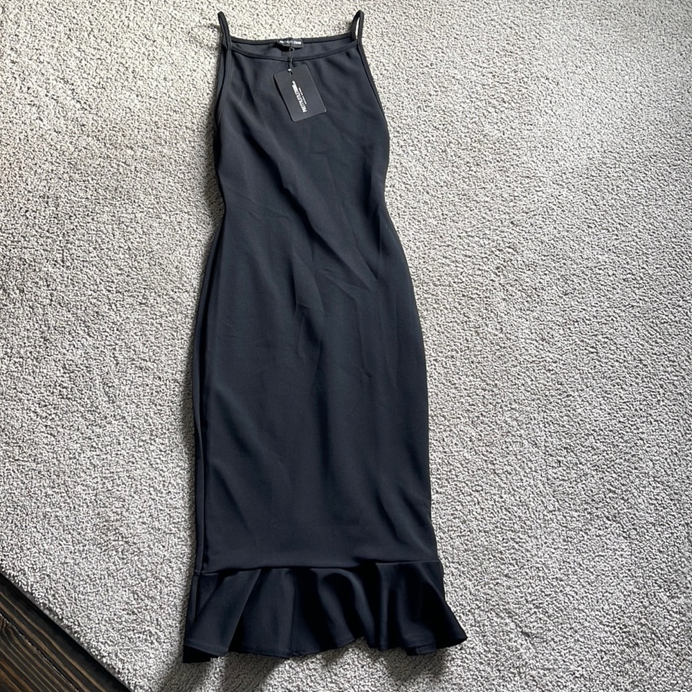 Black bodycon dress with ruffles